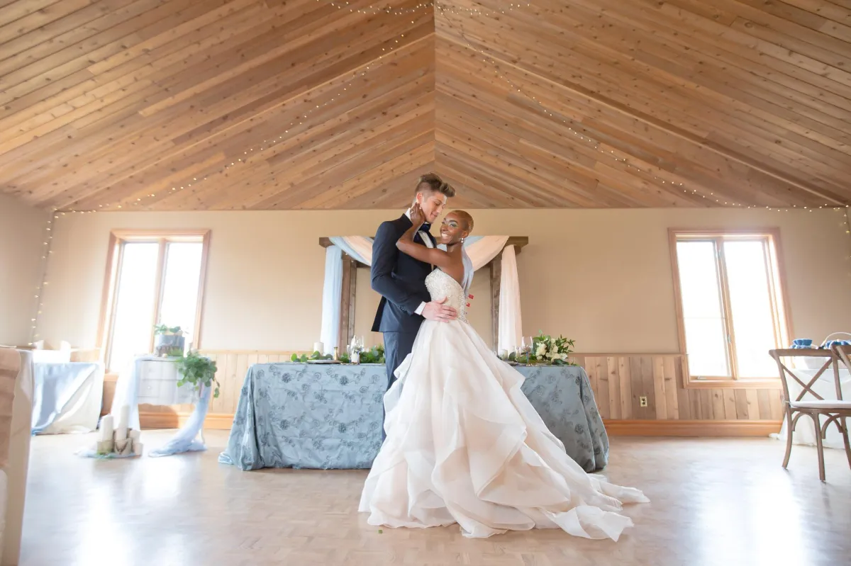 Bride Groom dancing and laughing at wedding