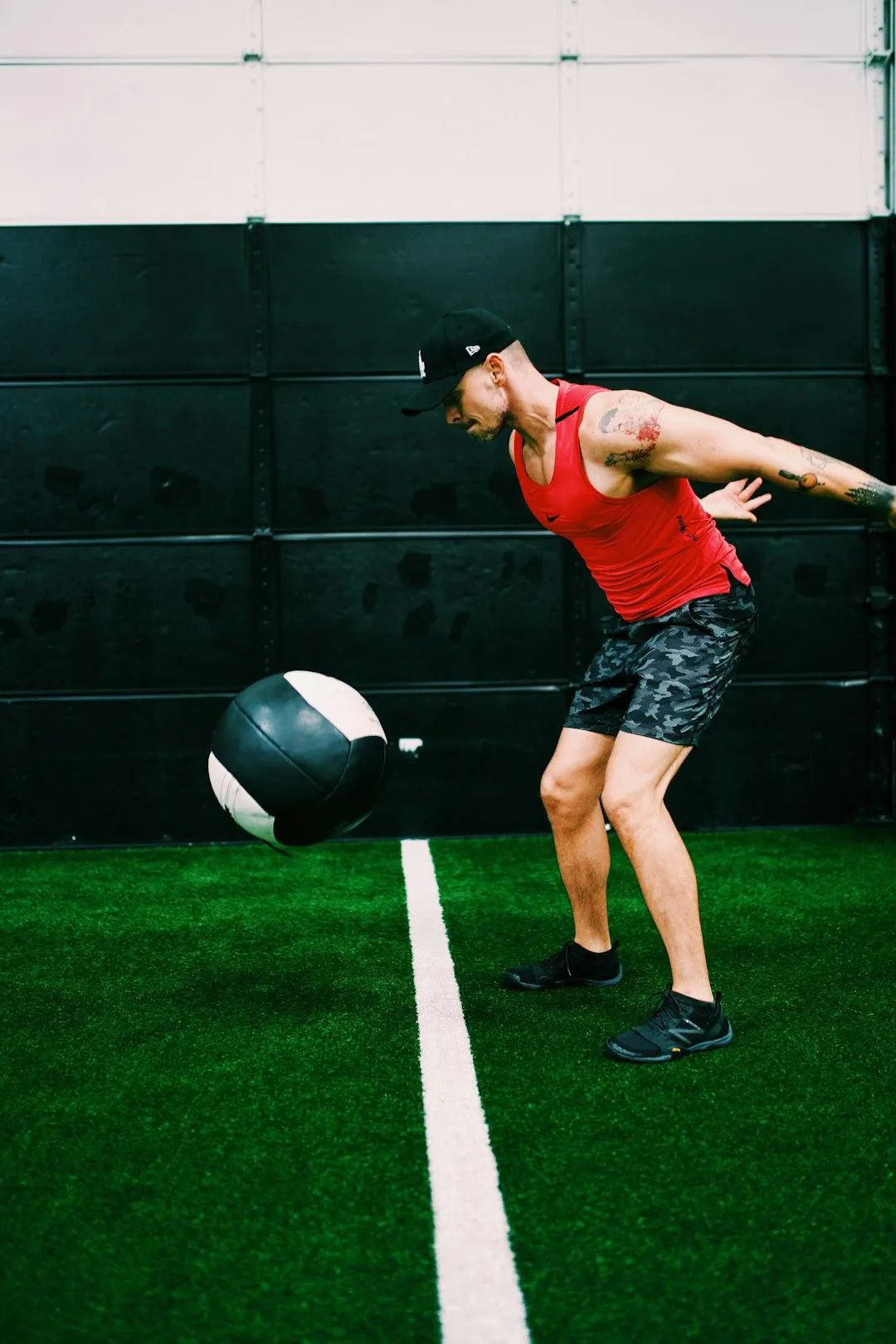 guy throwing medicine ball
