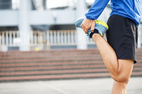 man stretching blog post cover