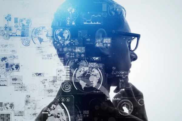 A side profile of a thoughtful professional, overlaid with digital data visualizations — including world maps, graphs, charts, and interfaces — symbolizing the integration of human expertise and artificial intelligence.
