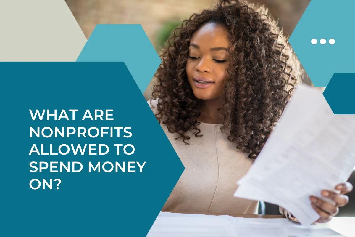 black woman holding spreadsheets