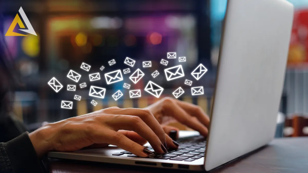 woman writing emails at computer