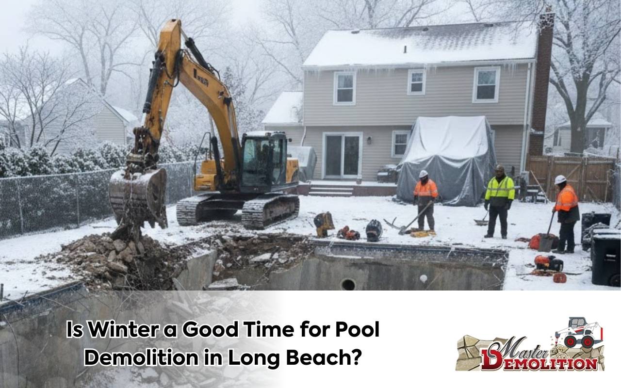 Excavator starting Winter Pool Demolition in Long Beach with a clear backyard prepared for removal.