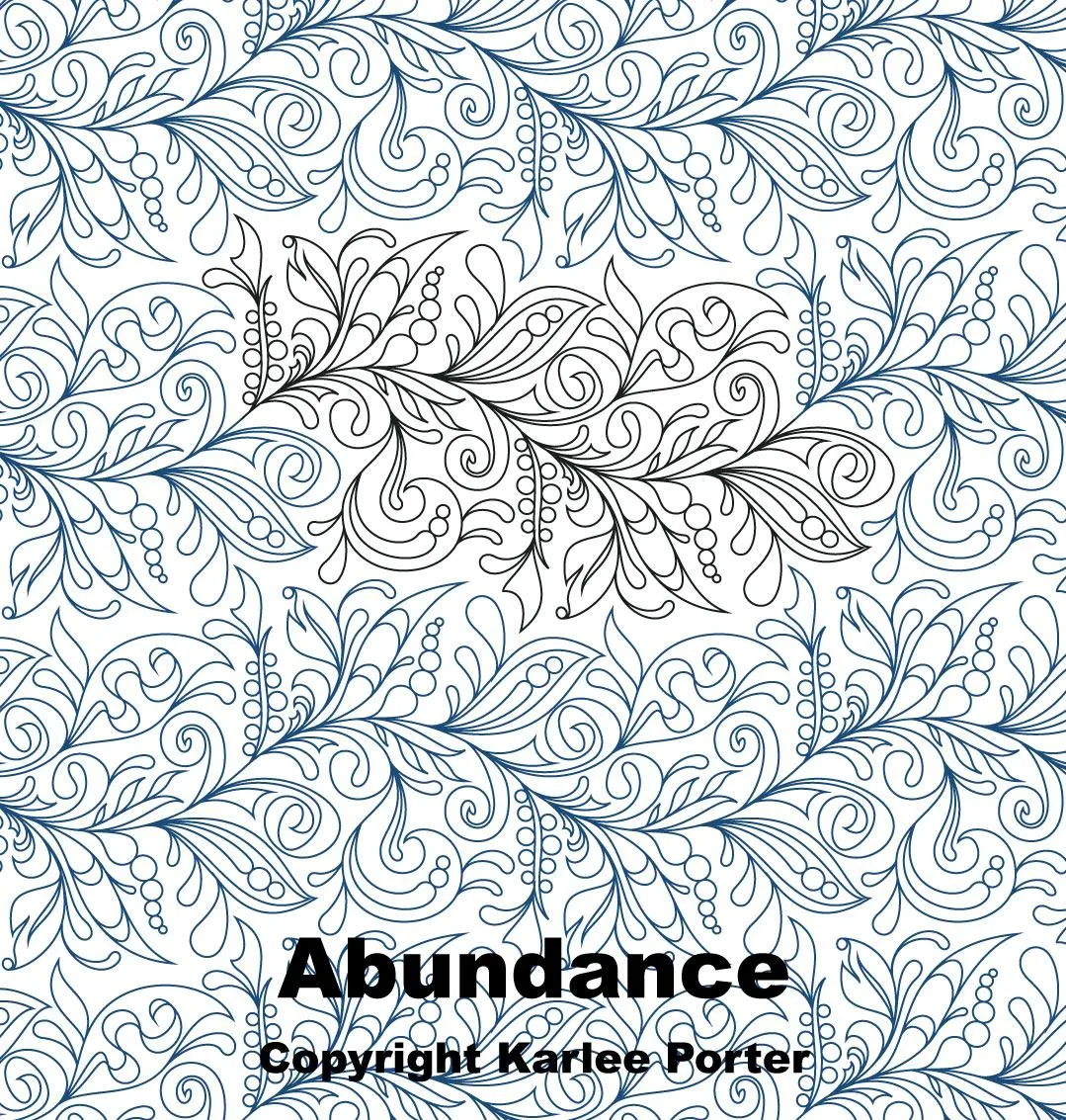 Whimsical quilting designs with feathers and flourishes.