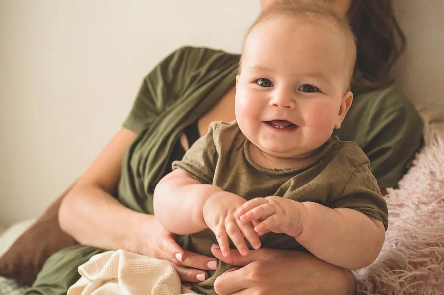 Sleep Training at 8 Months: What to Do When Your Baby Rolls or Sits Up in the Crib