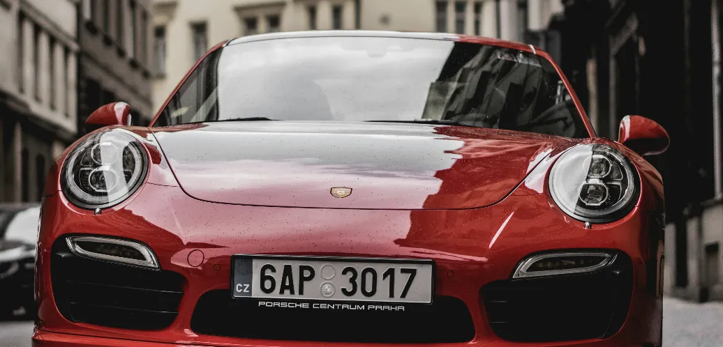 Front Bumper of a Red Porsche