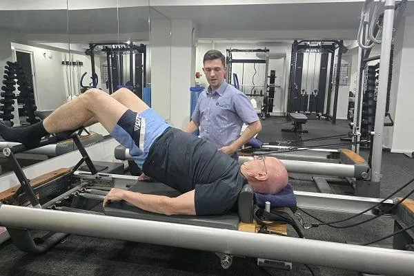 All Care Rehab Central Physio working with client