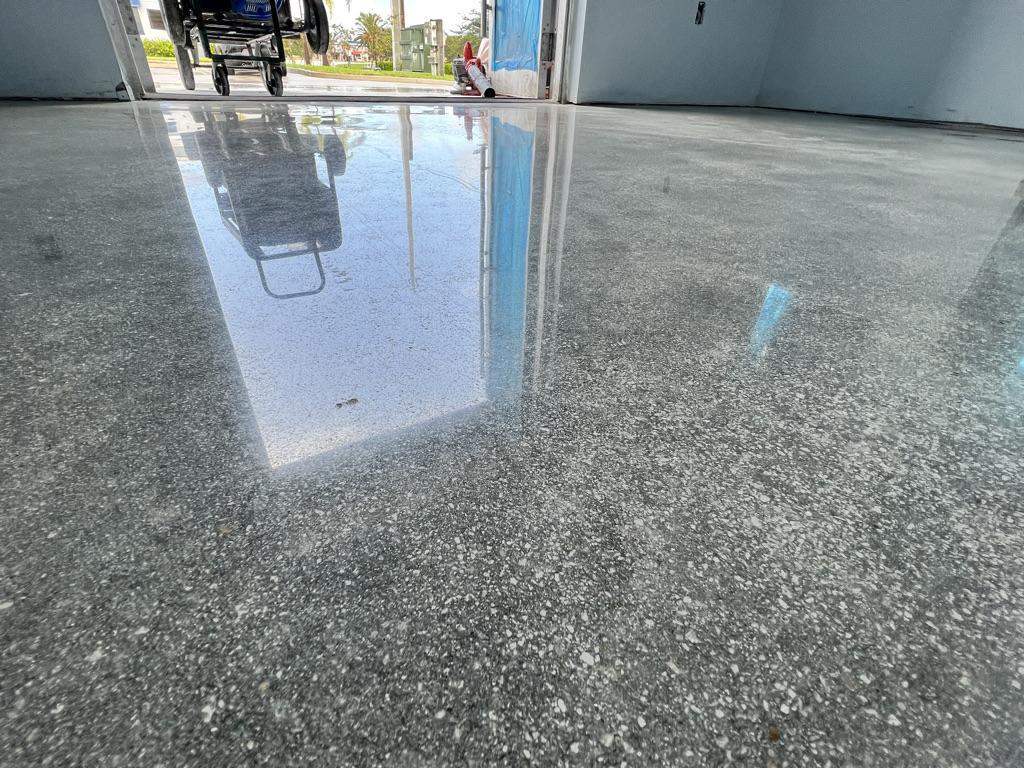 Polished concrete garage floor with a high-gloss finish in a modern Vancouver home