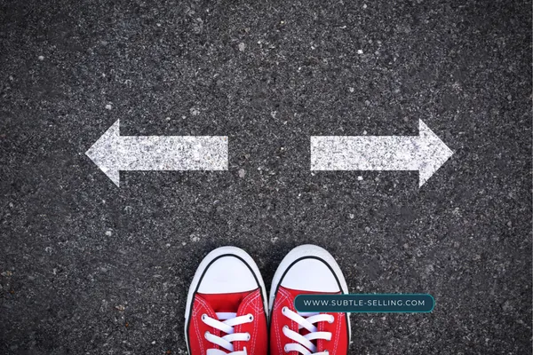 a choice dilemma with red shoes in front of arrows pointing in two directions