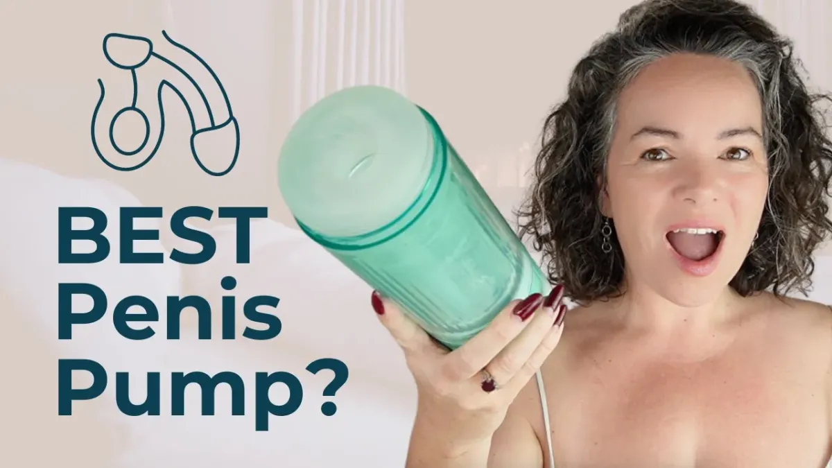 image of woman holding a penis pump masturbator