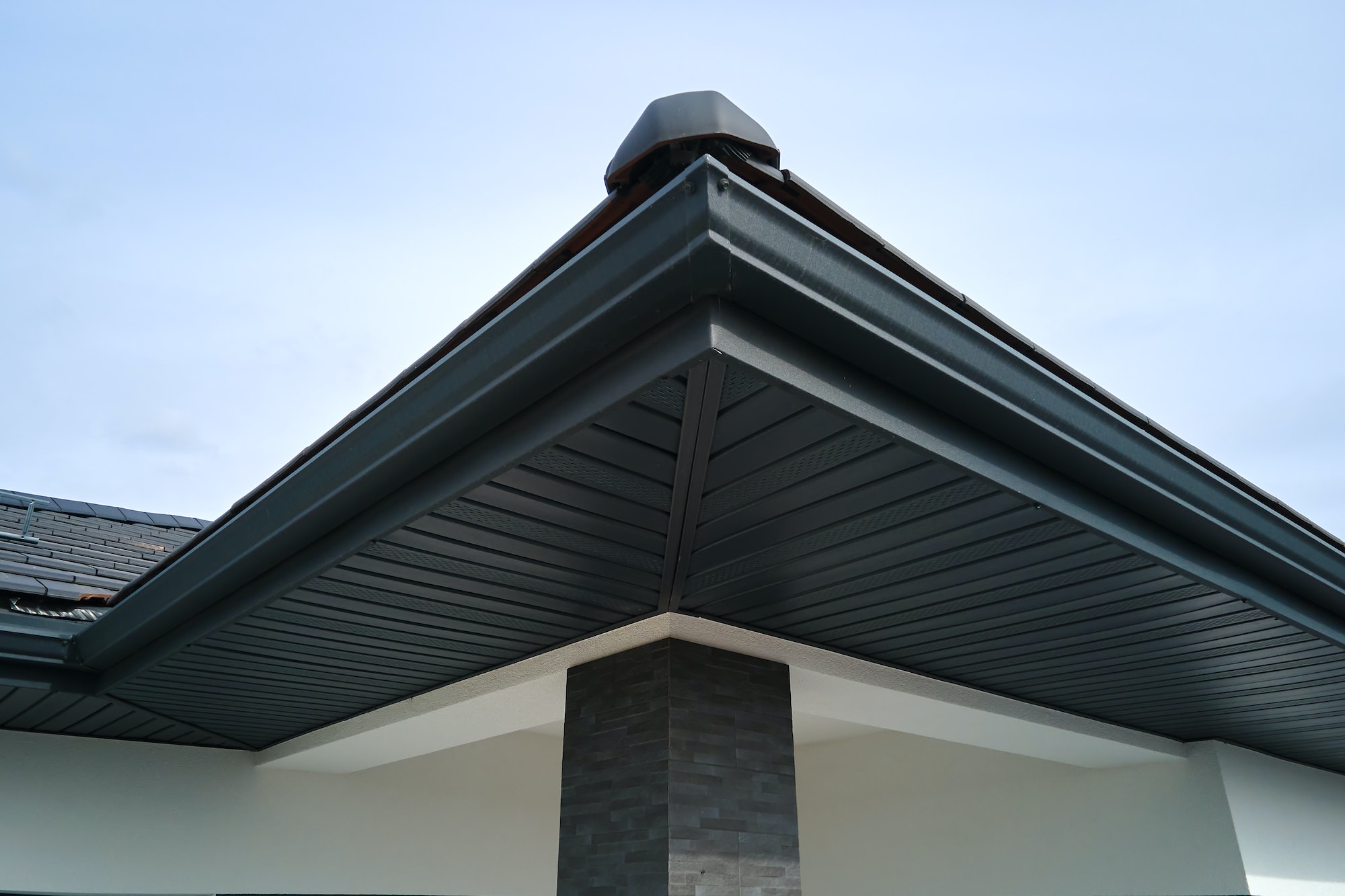 Integrated fascia, soffit, and seamless gutter system on high end home in Lehi Utah