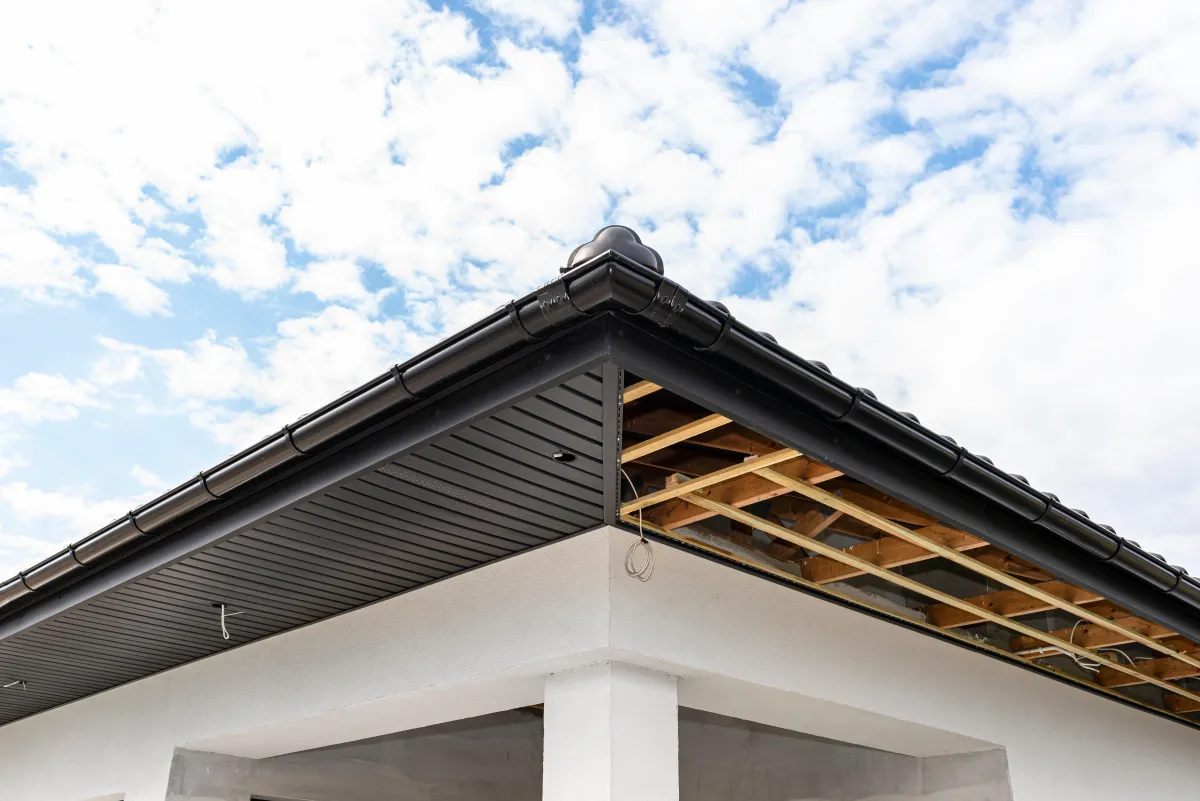 Black seamless aluminum gutter and soffit system on modern home in Draper Utah