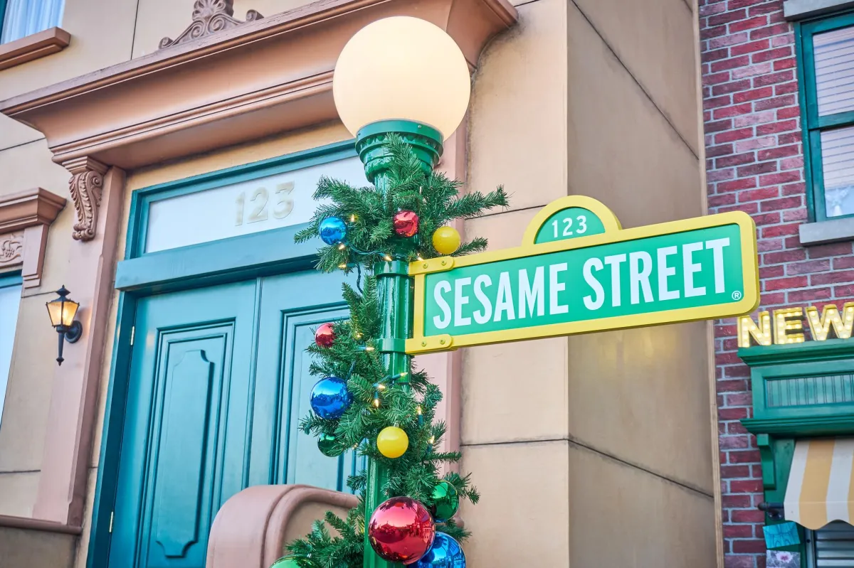 Christmas decorations on the Sesame Street sign at Sesame Place San Diego