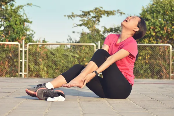 woman with ankle pain