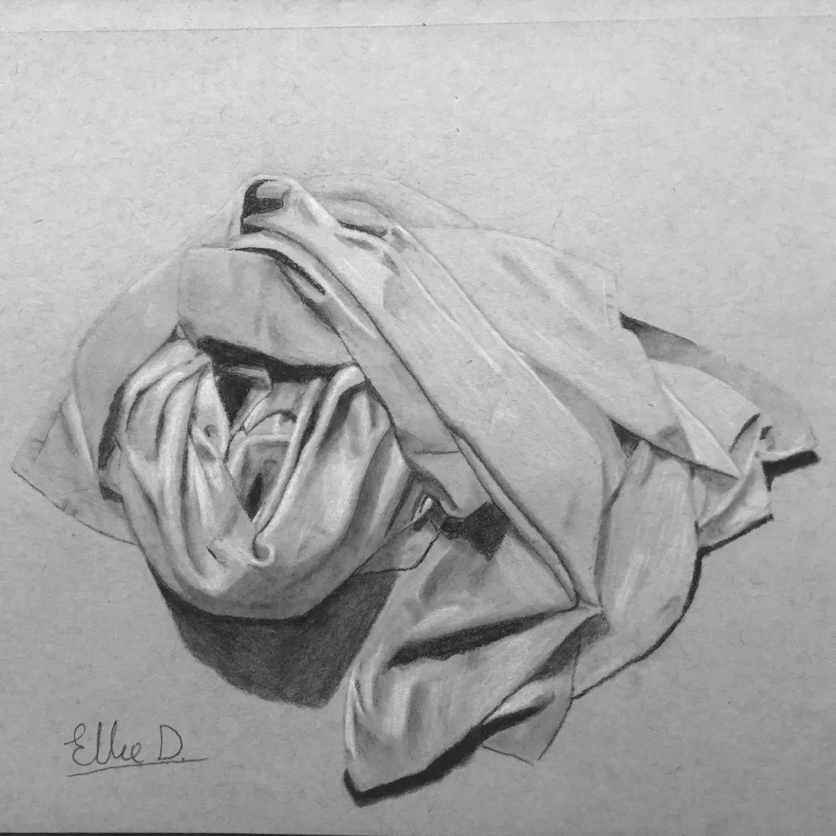 Charcoal drawing of folded sheets