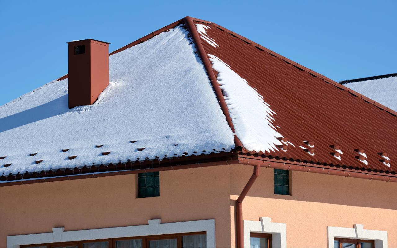 Roof snow guards and gutter protection for snow in New Rochelle preventing sudden roof snow slides.