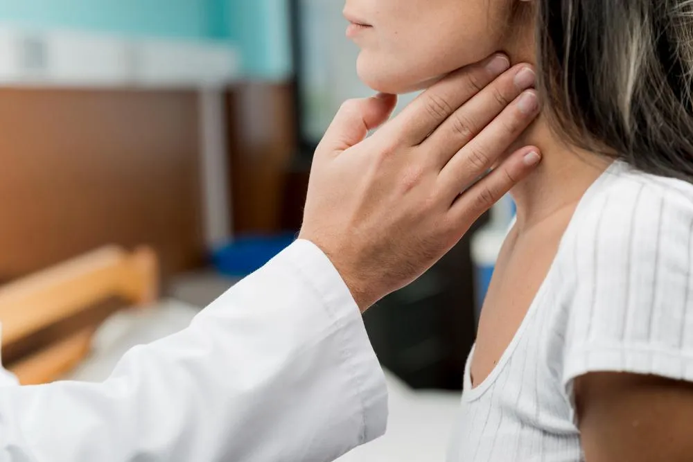 Examining Thyroid