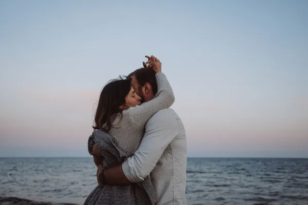 couple embracing on the beach