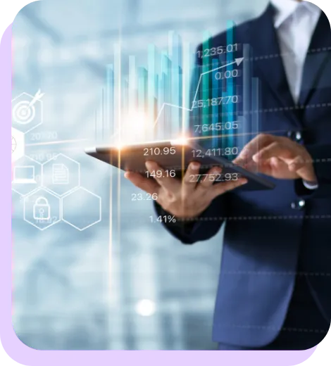 Man with laptop recording business metrics