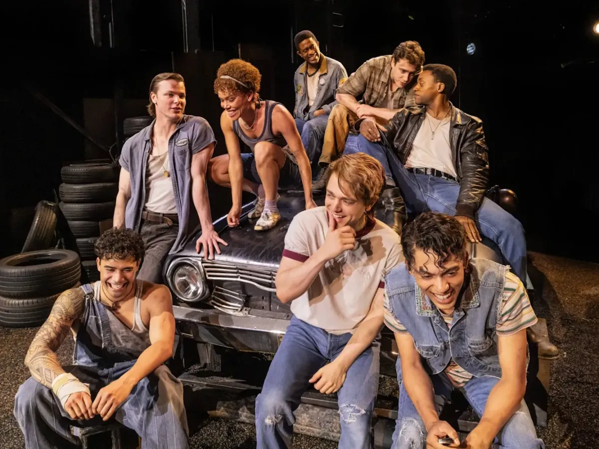 The Outsiders Cast Posing On/Around a Car