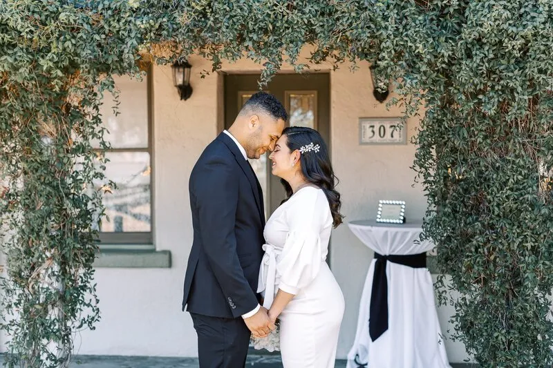 Bride + Groom in front of the Antique Wedding House in Mesa Arizona