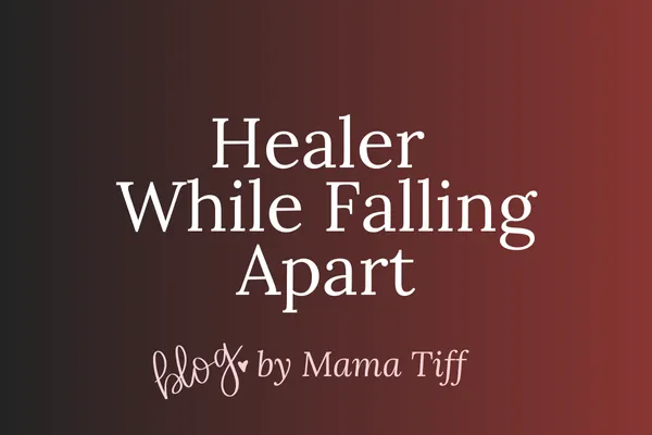 Woman sitting on bed, crying and processing trauma