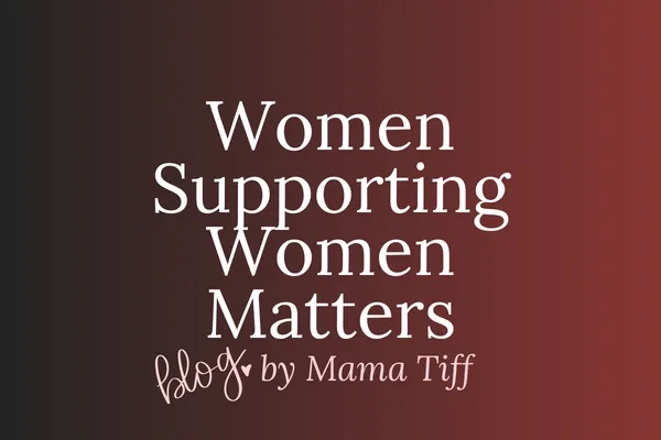 Women sitting at a kitchen table having an honest, supportive conversation.