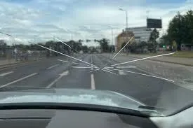 a driver with a cracked winshield