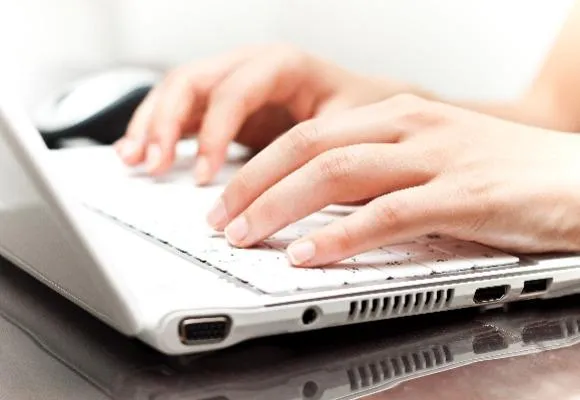 Writing on a laptop