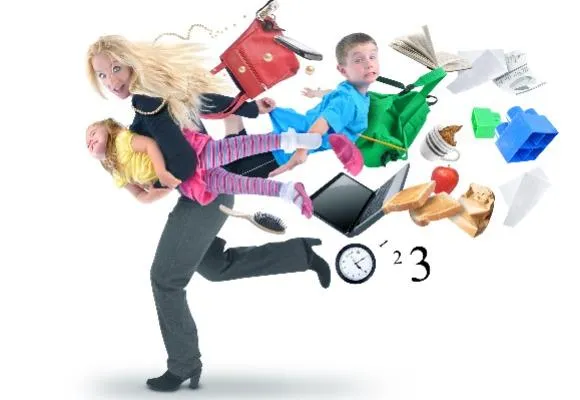 Stressed mother running late with kids and other things in tow