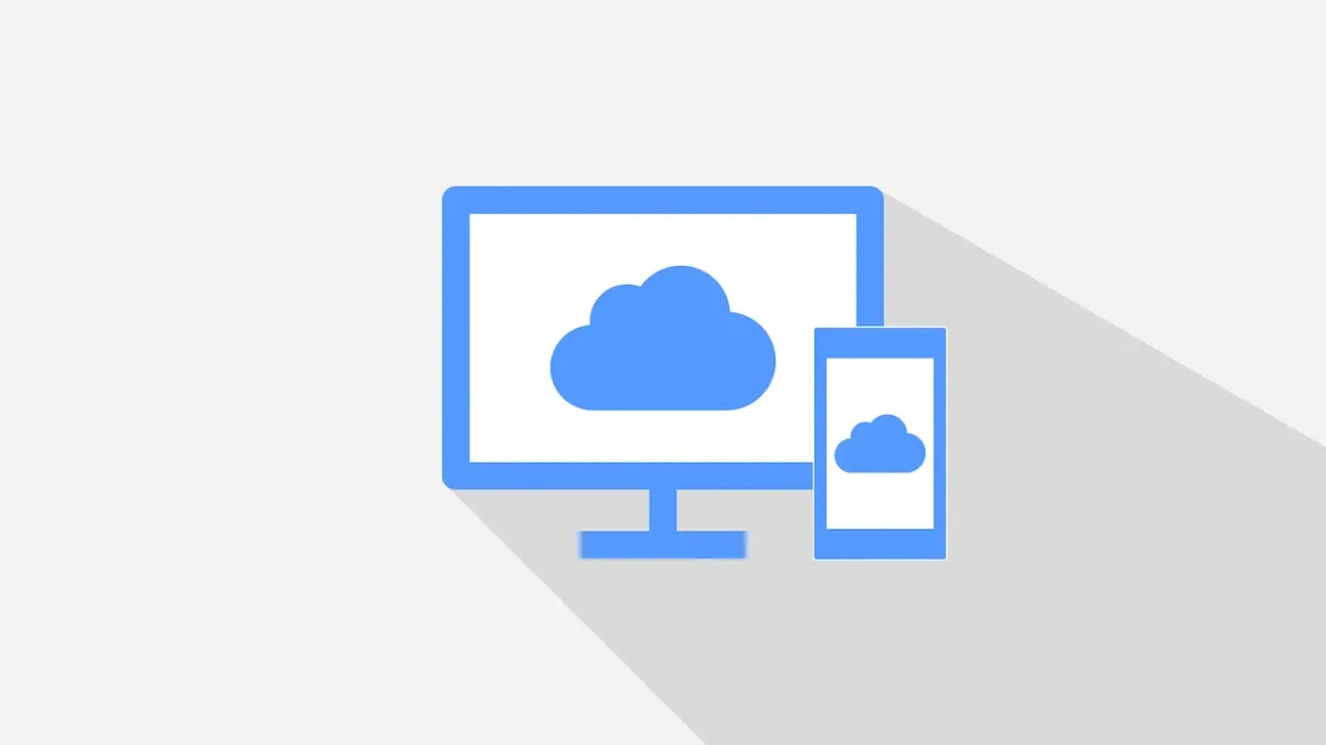 Cloud computing - image shows a graphic of a large screen with a cloud casting a shadow on a small screen with a cloud
