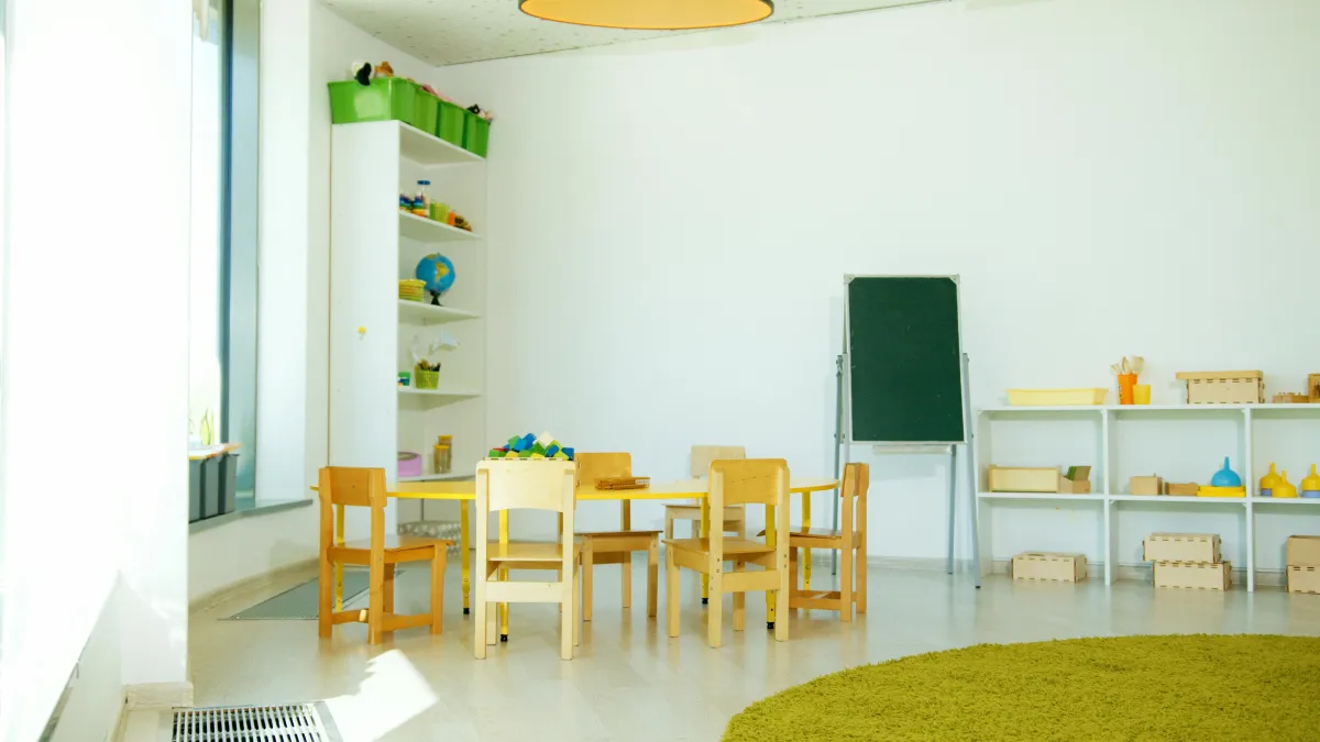 Cover image showing a confident childcare director leading staff in a classroom, symbolizing the Texas Childcare Director Credential and its role in leadership, compliance, and career growth.
