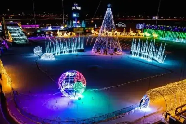 Birds-eye view of CHS field in Minnesota lit up with holiday lights