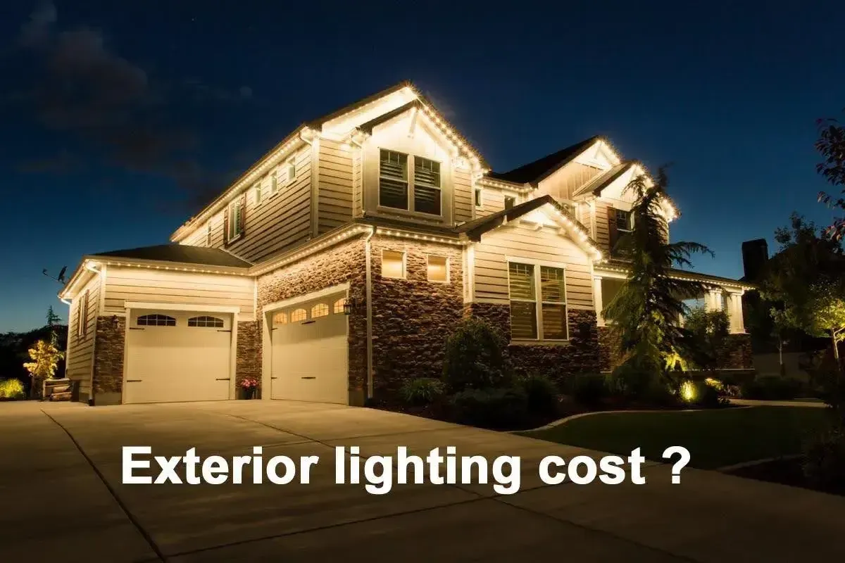 A beautifully lit house showcasing exterior lights, highlighting the cost of outdoor lighting options.