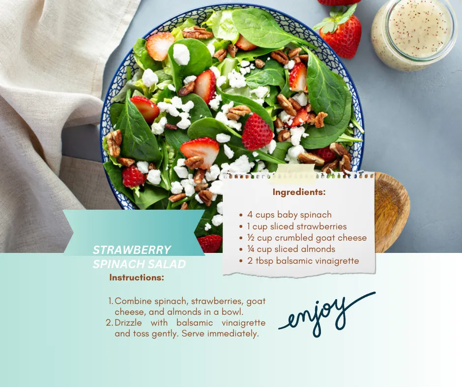 Bowl of strawberry spinach salad with goat cheese and almonds.