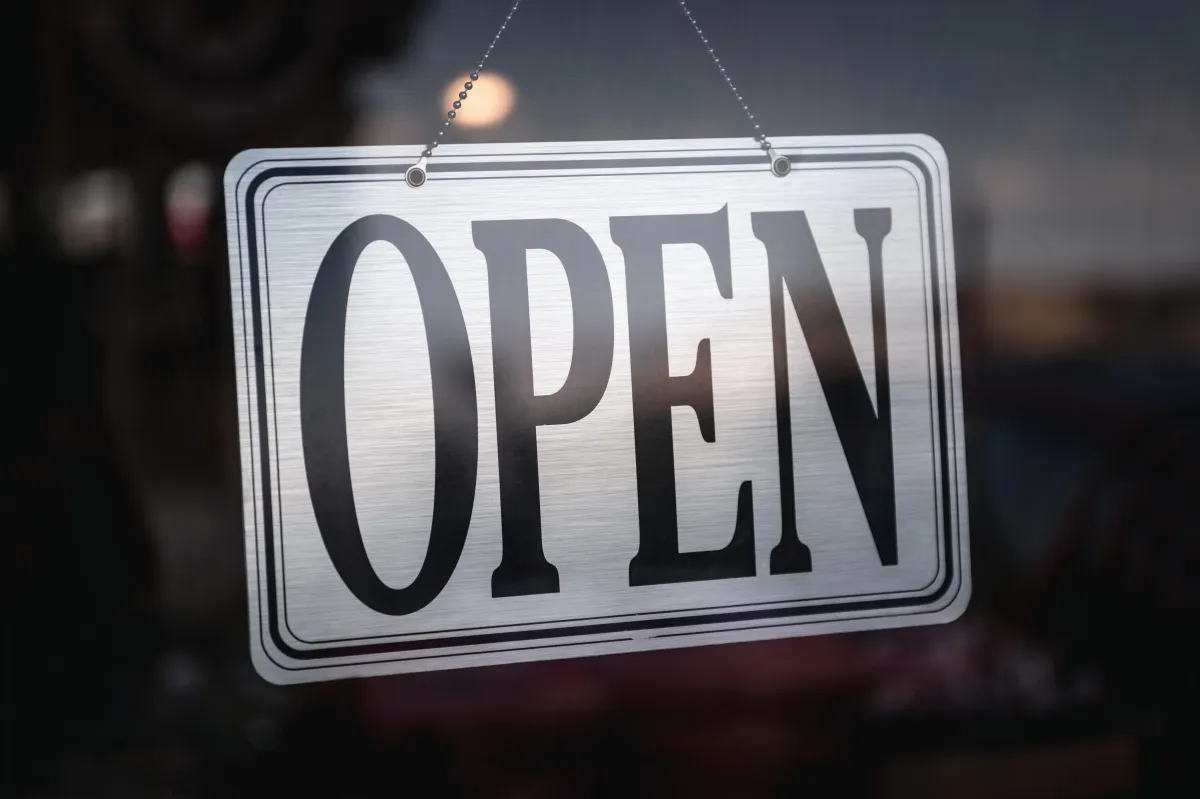 an open sign for a business