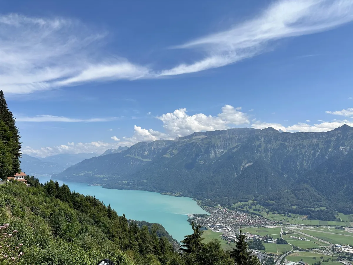 A beautiful view of a lake and mountains in Switzerland