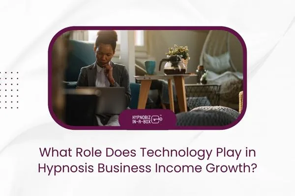 Professional woman working on a laptop in a cozy office setting, illustrating how technology contributes to hypnosis business income growth.