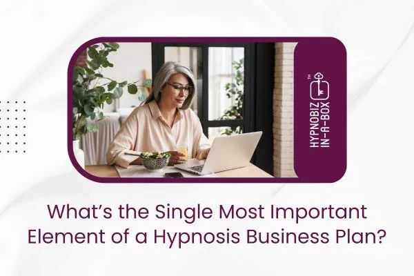 Woman using a laptop at a table with food, text reads: 'What’s the Single Most Important Element of a Hypnosis Business Plan?'