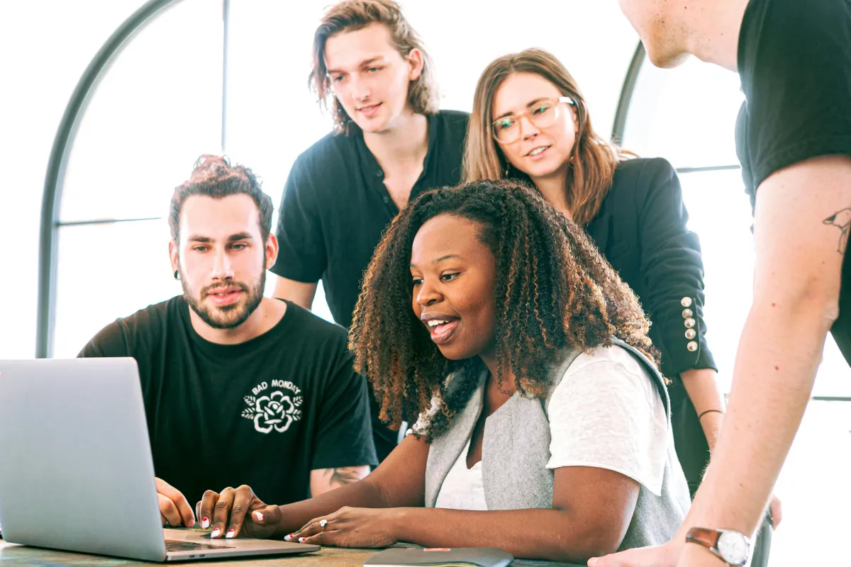 business team working together on a desk