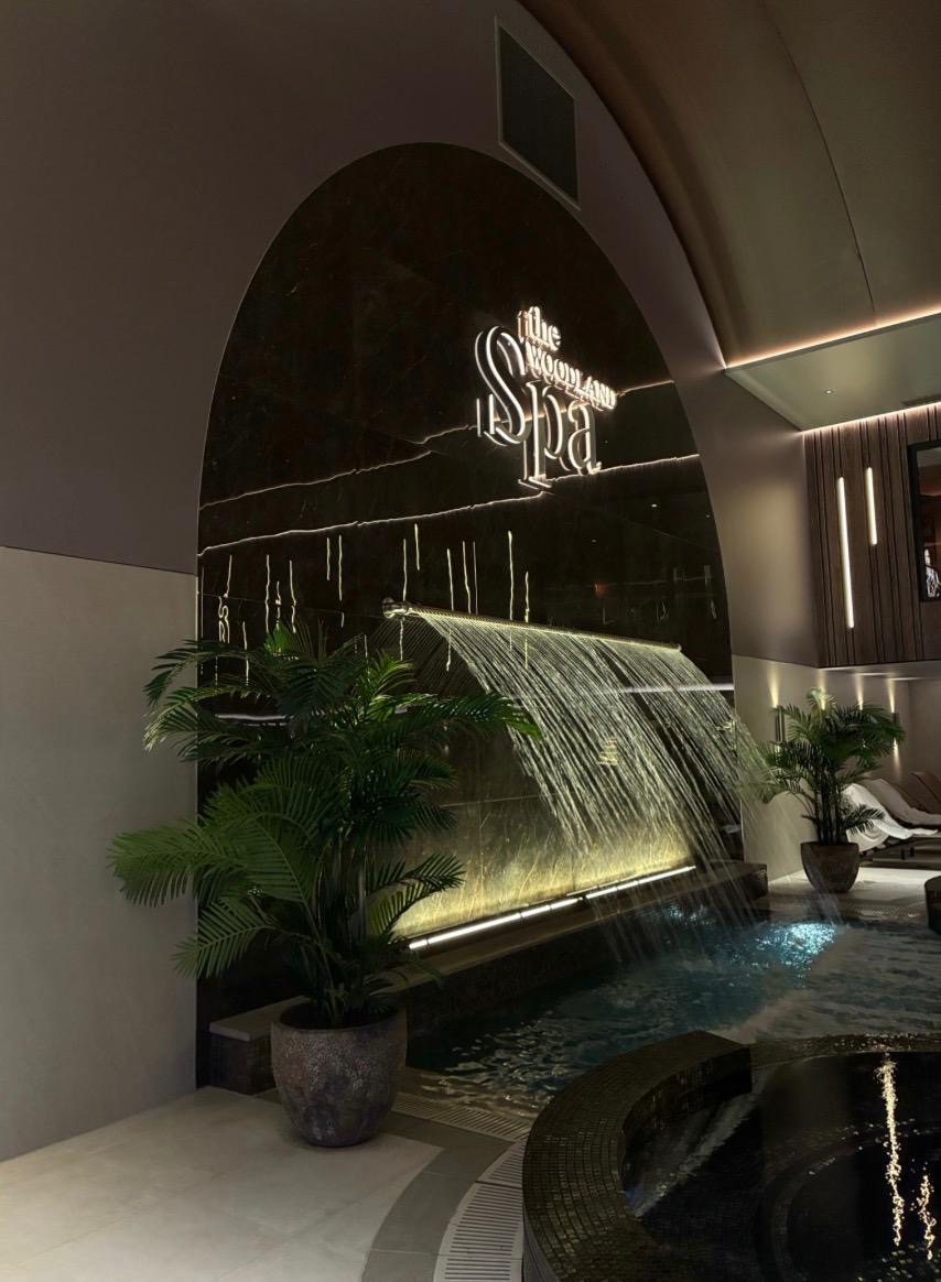 Serenity pool and water feature at Woodland Spa in Burnley, Lancashire, showcasing luxury spa design and a tranquil wellness environment.