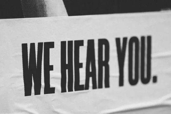 sign that says we hear you
