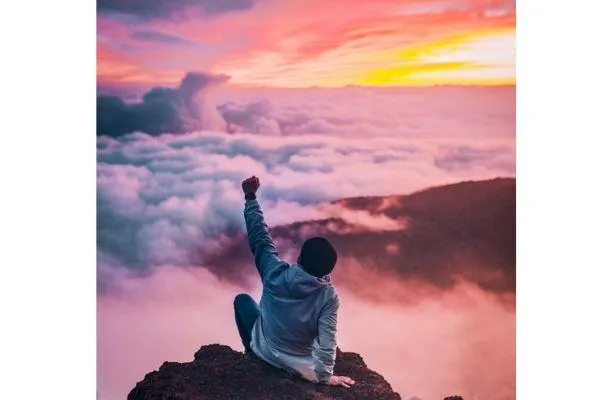 person on top of a mountain