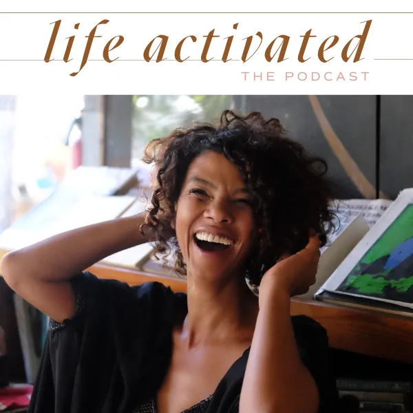 woman laughing with curly hair 