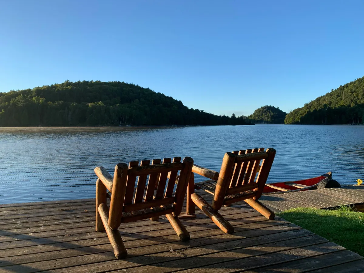 Chairs beside water