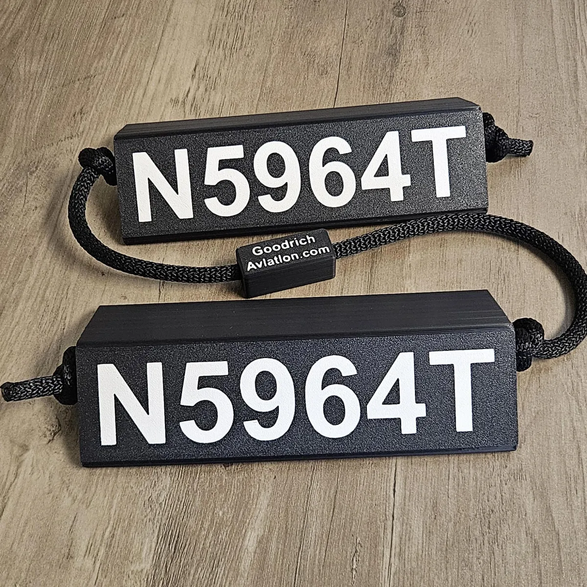 Black base white letters black rope