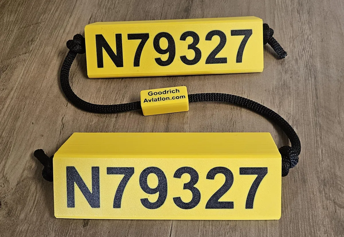 Yellow base black letters black rope