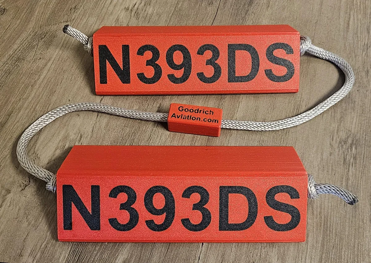 Red base black letters gray rope