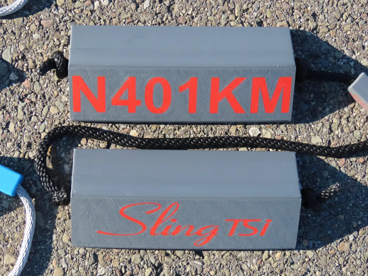 Dark gray base red letters black rope