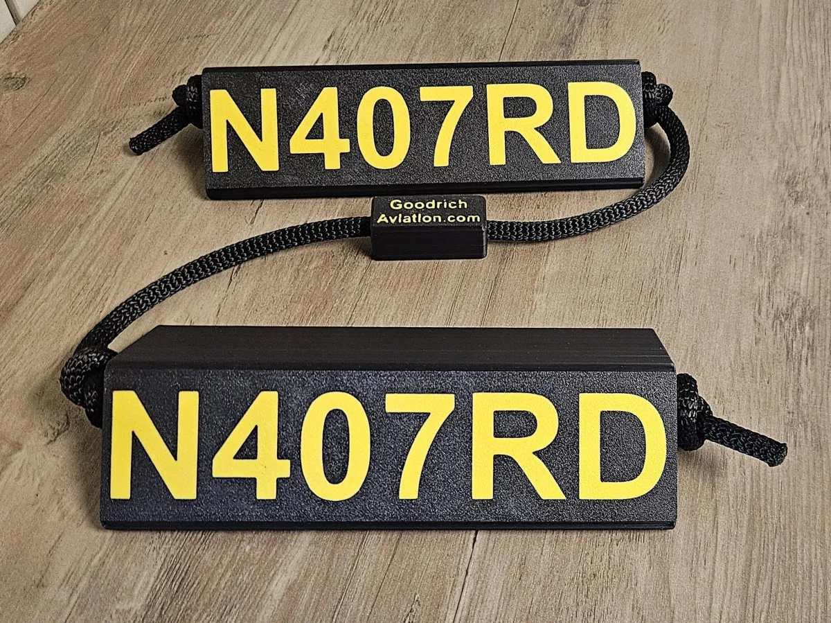 Black base yellow letters black rope